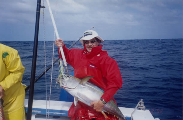 Dave Venn and a 13 Kg Yellowfin on a “Lumo Rooster” lure.