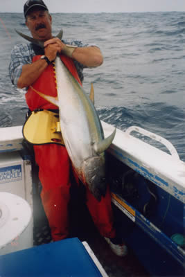 Randall Harrison and his 15 Kg Yellowfin caught by using a “Lumo” “Little Chook” lure.